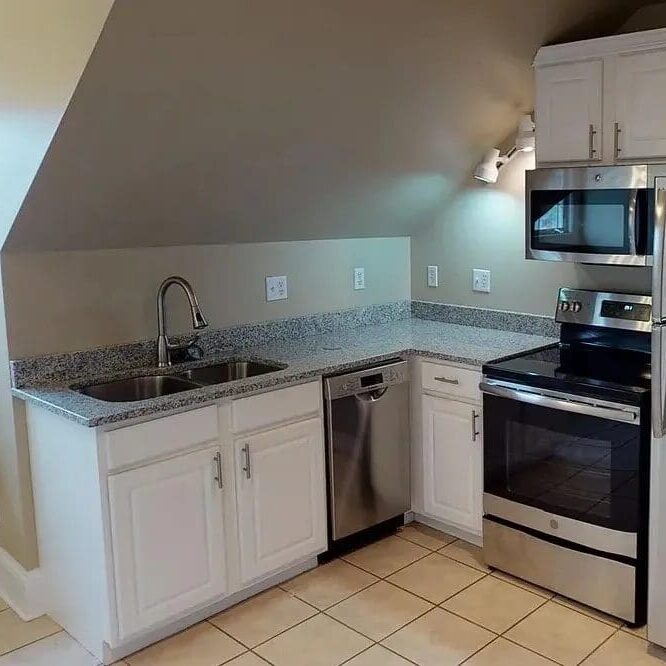 9175d7cd8bdf748493cdf48eee53c64f Modern kitchen with stainless steel appliances.